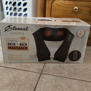 NWT new in box neck/back massager 
Never been opened !